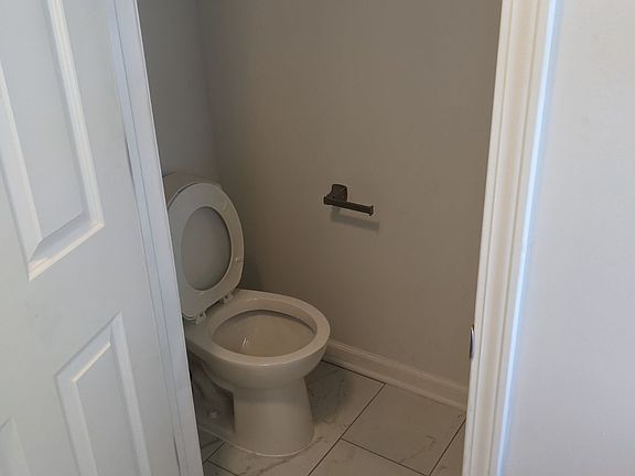 1/2 Bathroom off the back entrance