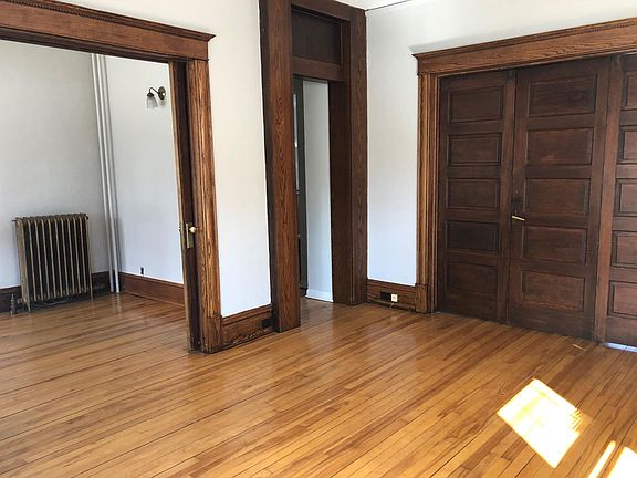 living room with pocket doors open that lead into the office or second small bedroom (8x10)