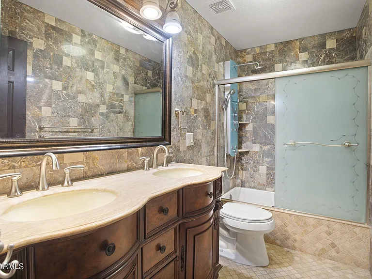 7775 N 52nd Dr — Photo 37