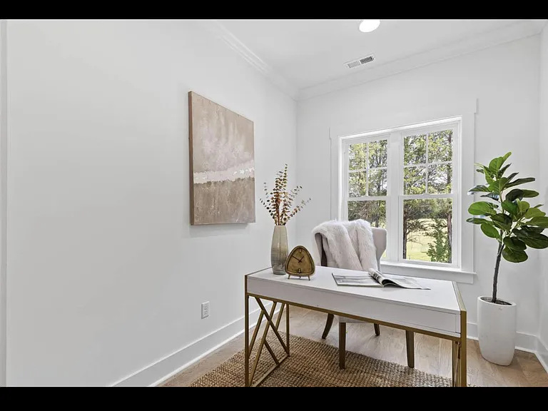 Private home office behind double doors.