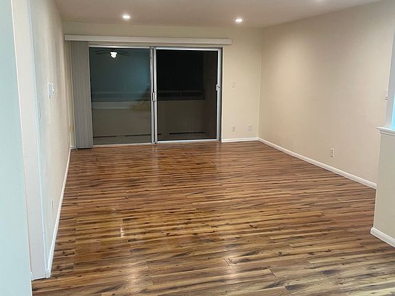 Open concept living. Large living space with patio balcony.
