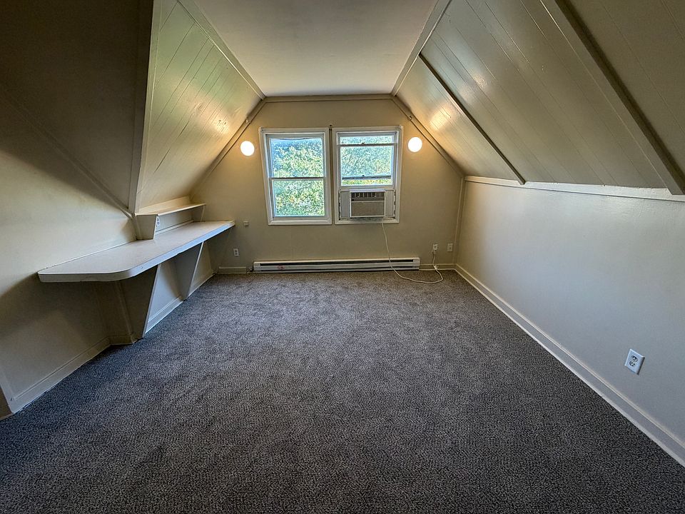 Master Bedroom facing windowed exterior wall