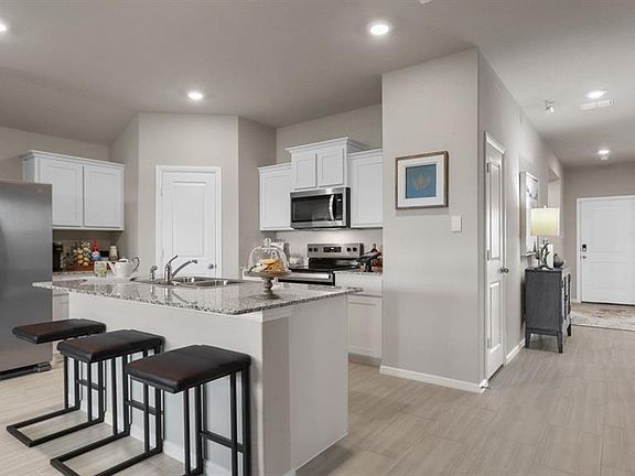Kitchen - All Home and community information, including pricing, included features, terms, availability and amenities, are subject to change at any time without notice or obligation. All Drawings, pictures, photographs, video, square footages, floor plans, elevations, features, colors and sizes are approximate for illustration purposes only and will vary from the homes as built.