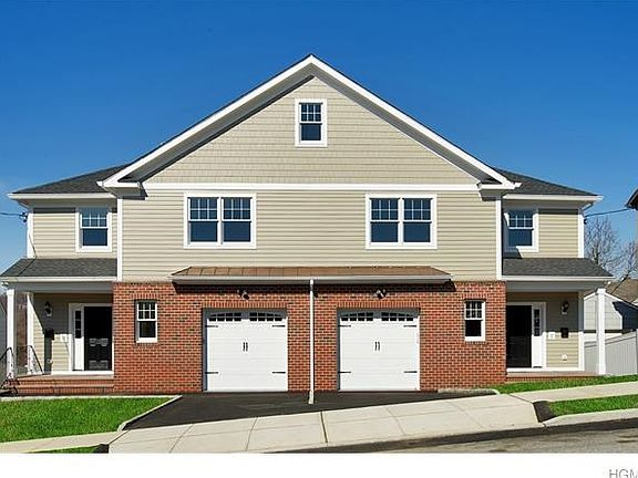 149 LINCOLN AVE IS THE RIGHT SIDE OF THIS 2 UNIT CONDO.