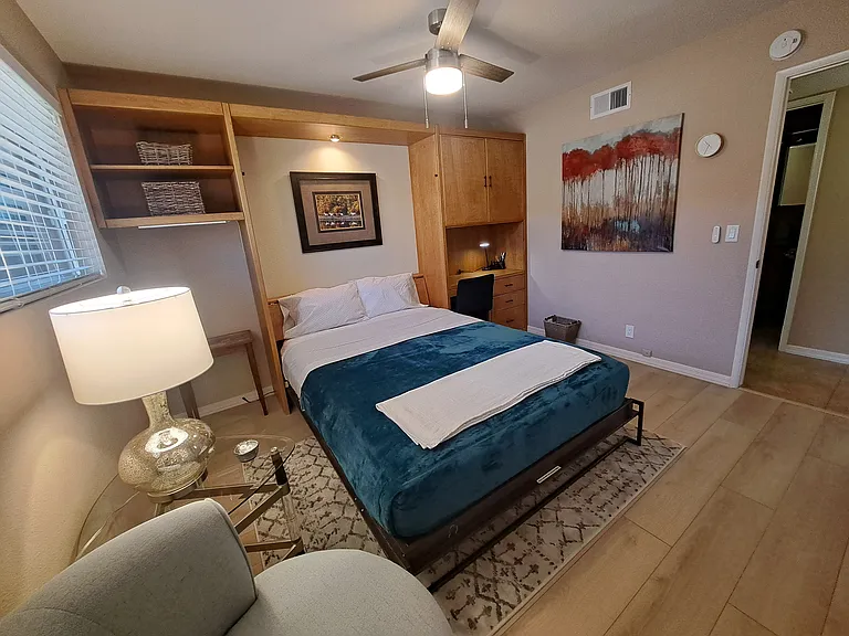 Queen murphy bed is very comfortable for your guests! This room also has 2 closets.
