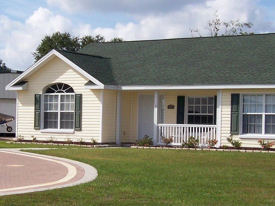 Frontal View of House and Hangar