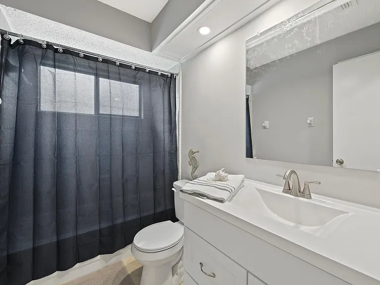 11530 Sweetwater Oaks Dr W — Photo 13