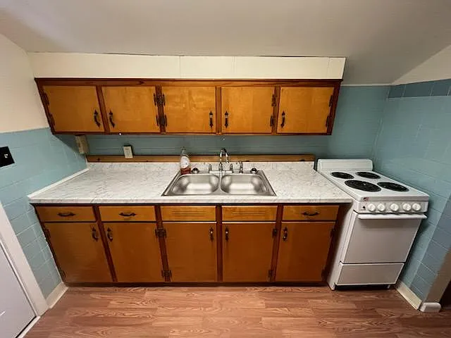 Kitchen cabinets, sink, oven - 270 E Allen St #D