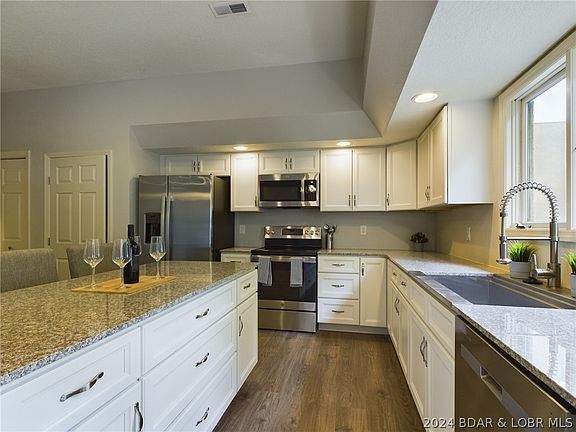 4th image of 496 Racquet Club Dr #411