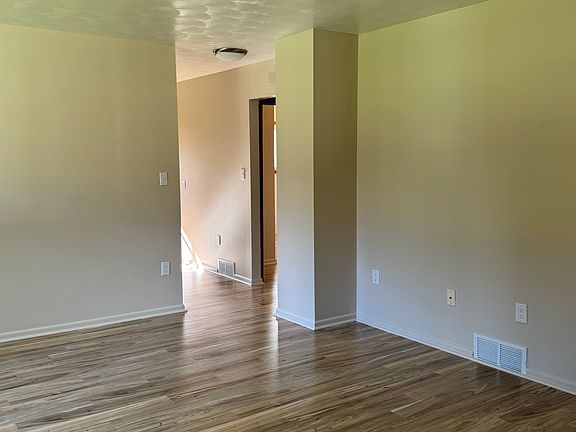 Living room leading to kitchen