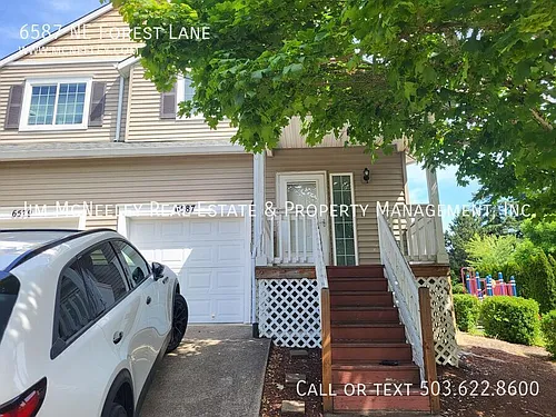 6587 NE Forest Ln Photo 1