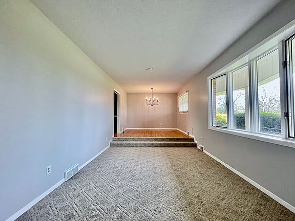 Step-Down Living Room leads to Dining Room