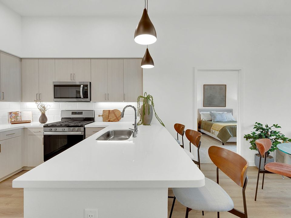 Bright kitchen with Euro-style cabinets at Enclave Heritage Flats in Otay Ranch