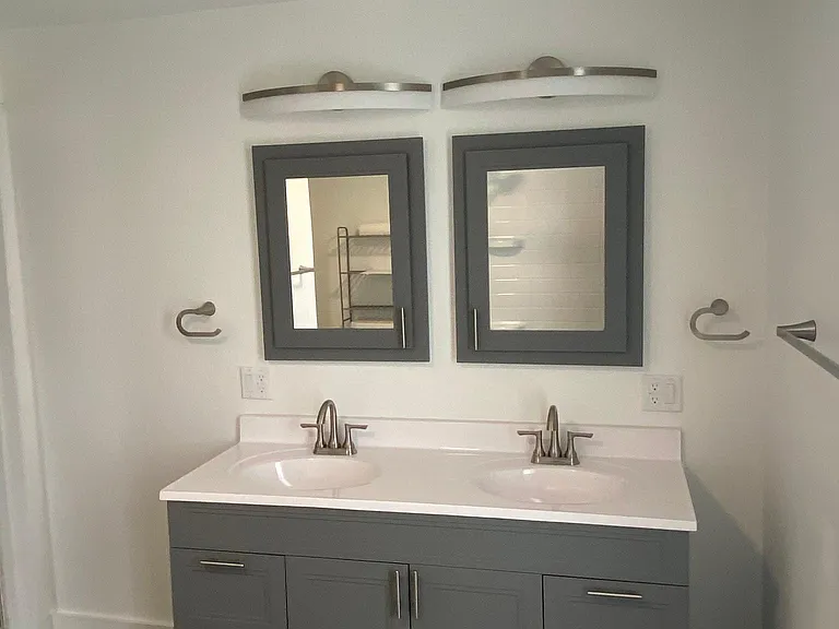 Recently remodeled spacious upstairs full bath with double vanity.