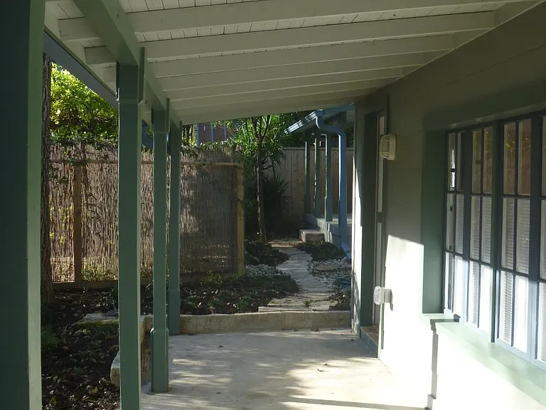 Front porch looking west toward studio porch in background