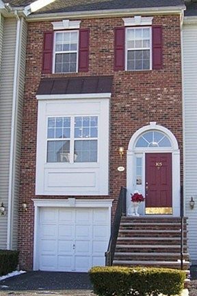 305 Cambridge Drive
						:
						Beautiful Antique Brick Front
