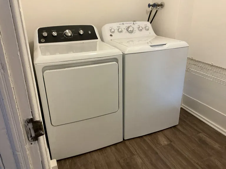 Full size washer and dryer in walk-in closet