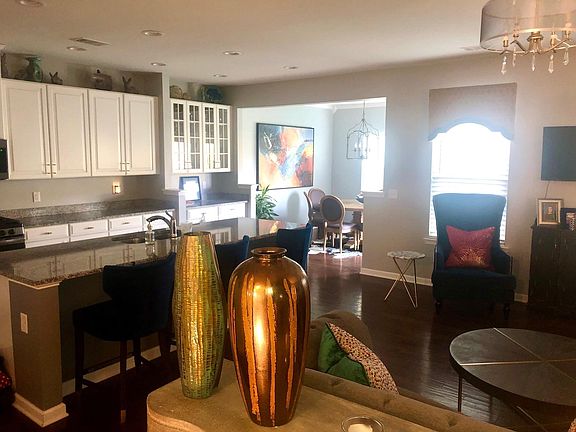 Dining Room, Living Room, and Kitchen