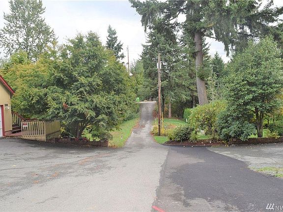 Street from driveway. Large parking lot for 8+ cars