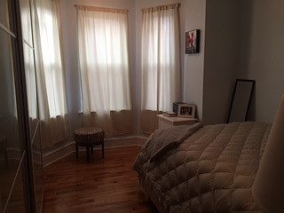 bedroom with bay window and gorgeous view