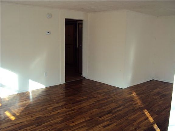 Living room facing the kitchen
