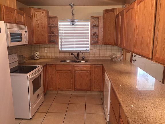 Kitchen with wood ceiling