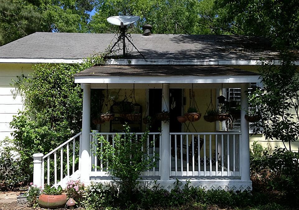 Fairytale like country home quietly nestled on 1.25 acre wooded tract. 2.5 additional acres for sale if interested