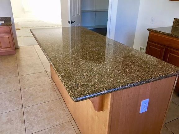 KITCHEN ISLE AND PANTRY ROOM