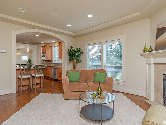 Great sight-lines from kitchen to living room means you can keep an eye on the game while prepping for dinner.