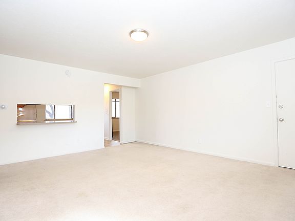 Unit 4 Living- Carpets have been replaced with Hardwood!