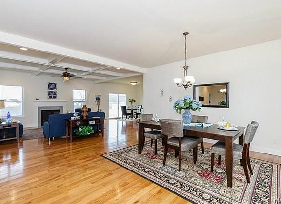 Open floor plan, hardwood floors, neutral decor