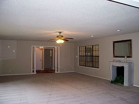 Living Room features an Italian Marble Fireplace.