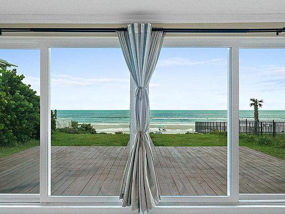 Beautiful view of the ocean with beach access from the backyard