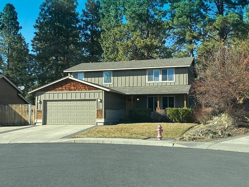 Bathed in Central Oregon light! A large two story home nestled in a cul-de-sac with quiet neighbors! Walk to Shevlin Park and easy access to Newport Market and NW Crossing!