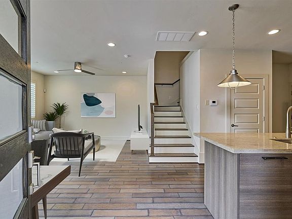 Upon entering this well appointed townhouse is a nicely sized, open concept eat in kitchen and living room area.
