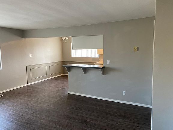 From living room looking toward kitchen and dining area