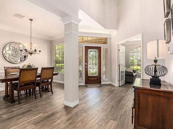 This home is light and bright along with being very welcoming to all that enter! Gorgeous wood-look tile flooring flows throughout most the the first floor including the primary suite, giving this home a seamless look!