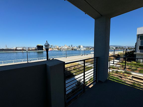 Balcony overlooking the estuary and park.