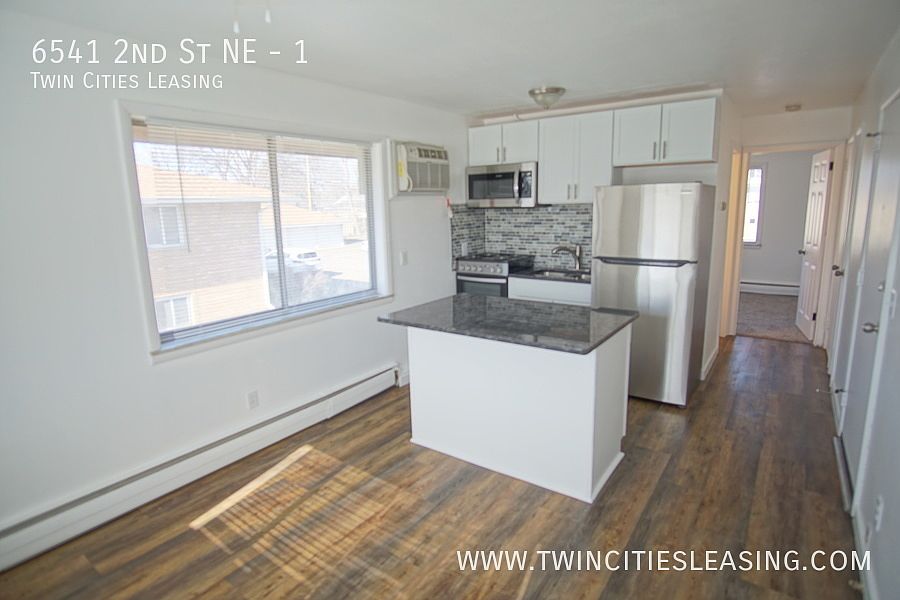 1st image of 6541 2nd St NE #1