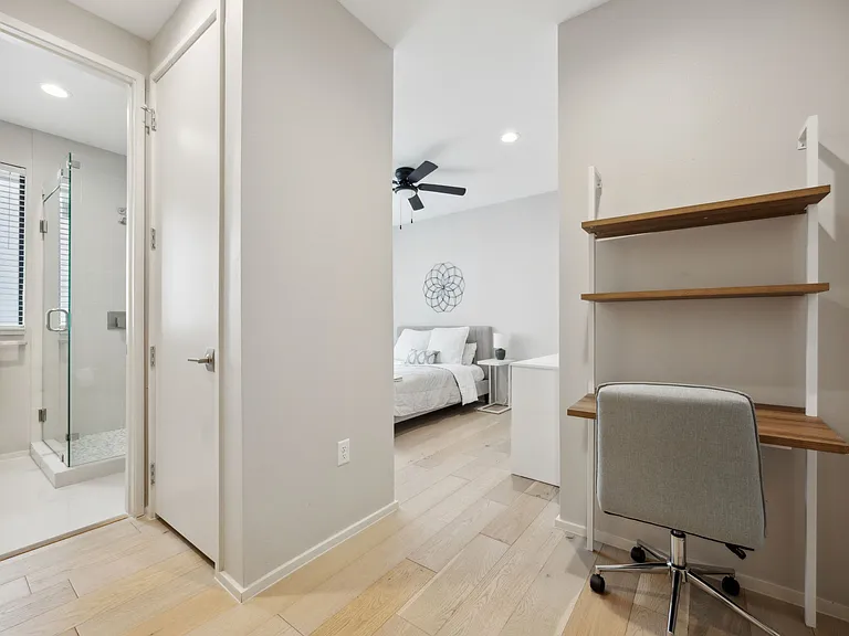 2nd Bedroom with full shower. Built in desk for mini work station