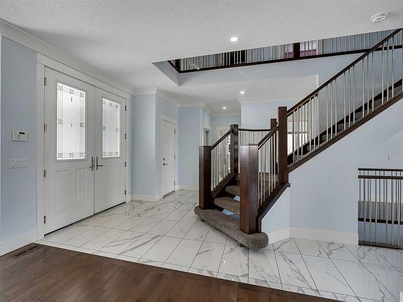 4th image of 272 Aspenmere Way S