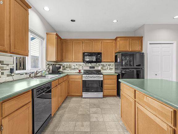 5th image of 14268 SW Windsong Ct