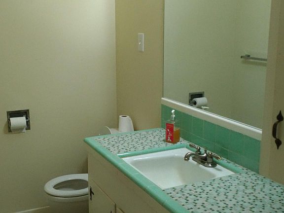 Guest bathroom with bathtub, shower