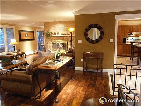 Spacious Living Room w/ Travetine Fireplace