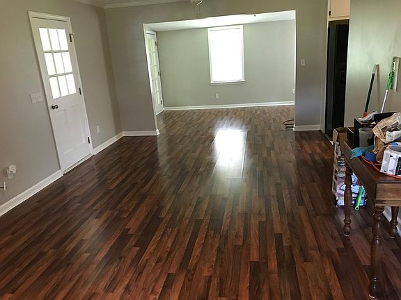 Living Room to Dining Room with a door to the 2 car garage