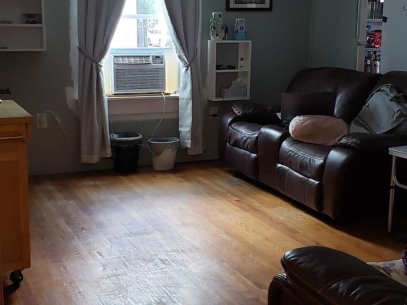 Living Room--Ultra Quiet Ceiling Fans, leather recliners, outstanding window A/C.
