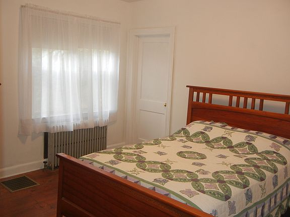 Bedroom w/door to attic