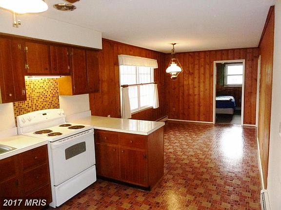Kitchen w/Glass Block backsplash behind the Stove