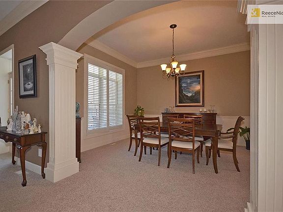Arched entryways and heavy crown moldings
