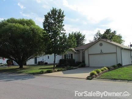 Fully landscaped with mature trees